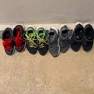 4 pair of size 1 Nike shoes. Gently used